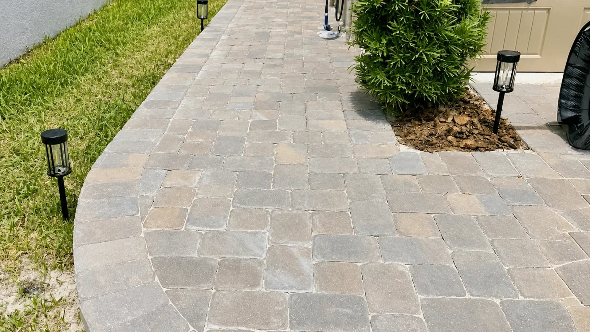 Before and after removing rust stains from concrete pavers Before and after removing rust stains from concrete pavers