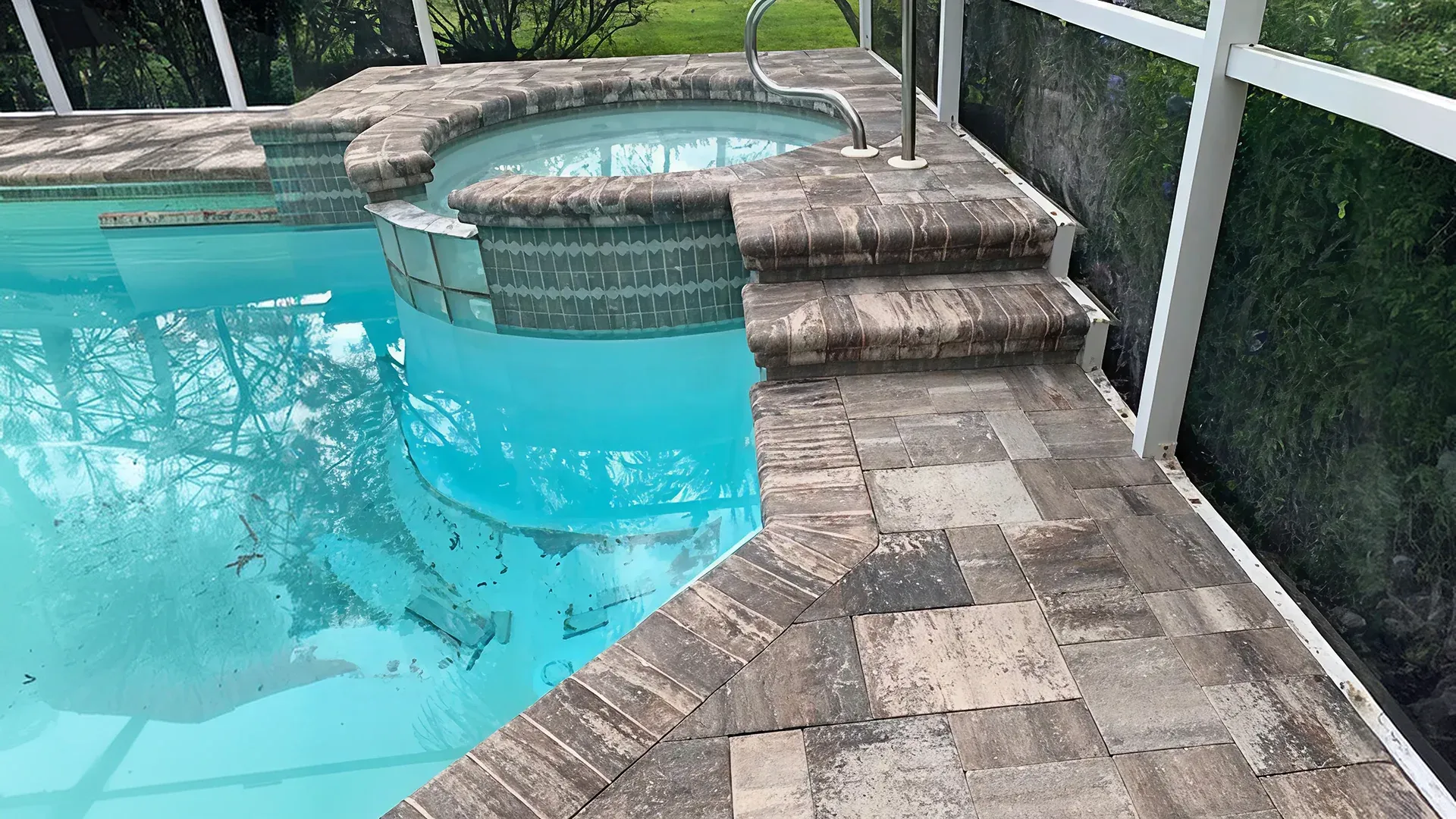 Resort-inspired pool deck lighting with warm LED lights and illuminated swimming pool in Lakeland Resort-inspired pool deck lighting with warm LED lights and illuminated swimming pool in Lakeland