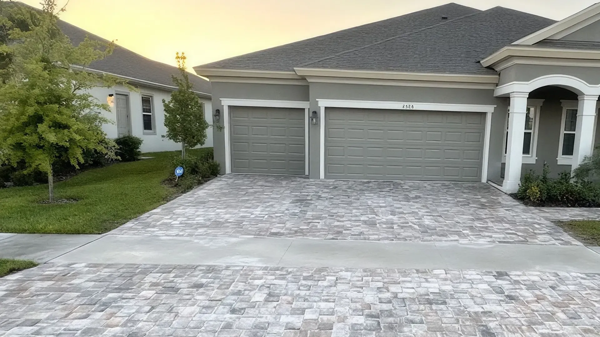 Driveway paver repair with a section being rebuilt in Lakeland FL