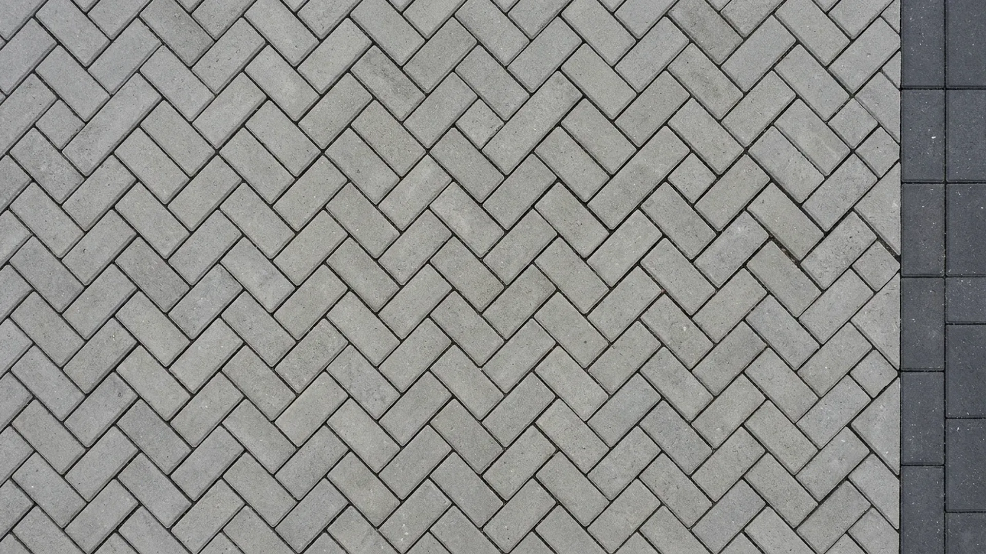 Herringbone paver pattern with a darker border strip