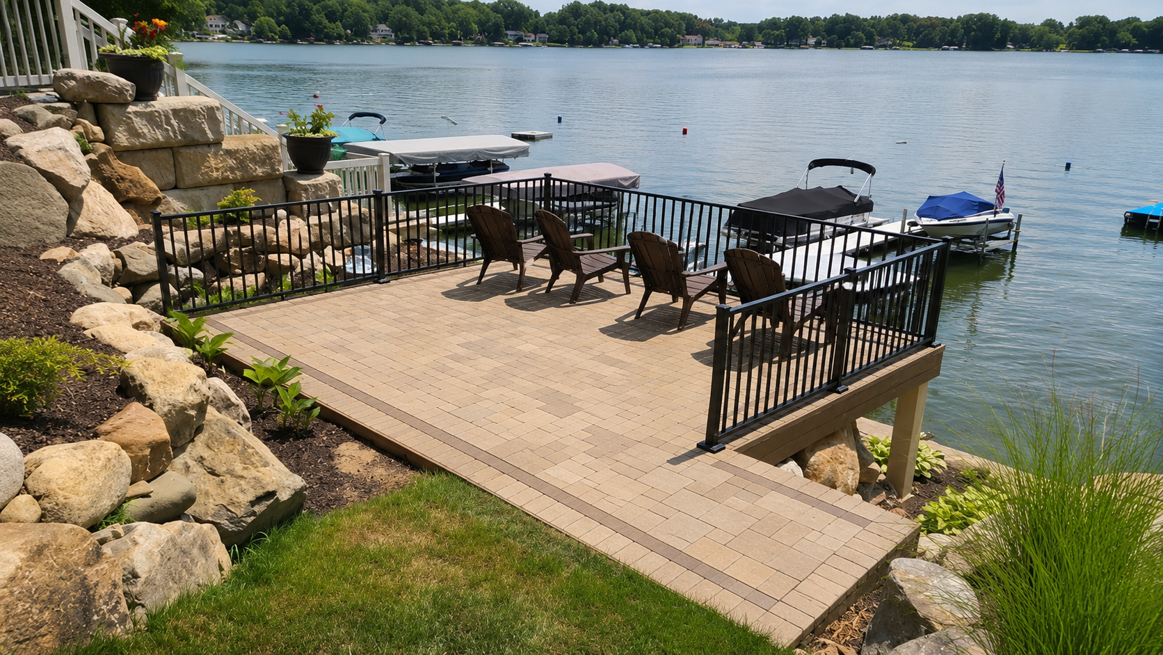 Lakefront patio with light paver colors near a dock in Winter Haven, FL Lakefront patio with light paver colors near a dock in Winter Haven, FL