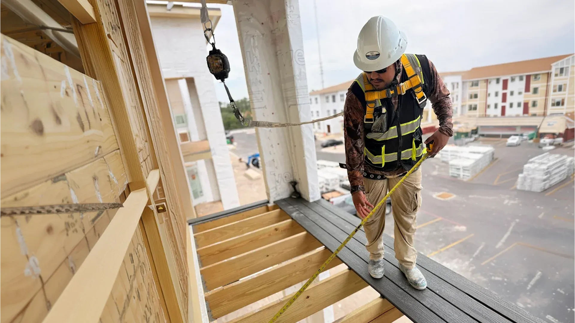 a homeowner asking questions of a roofing contractor in Polk County