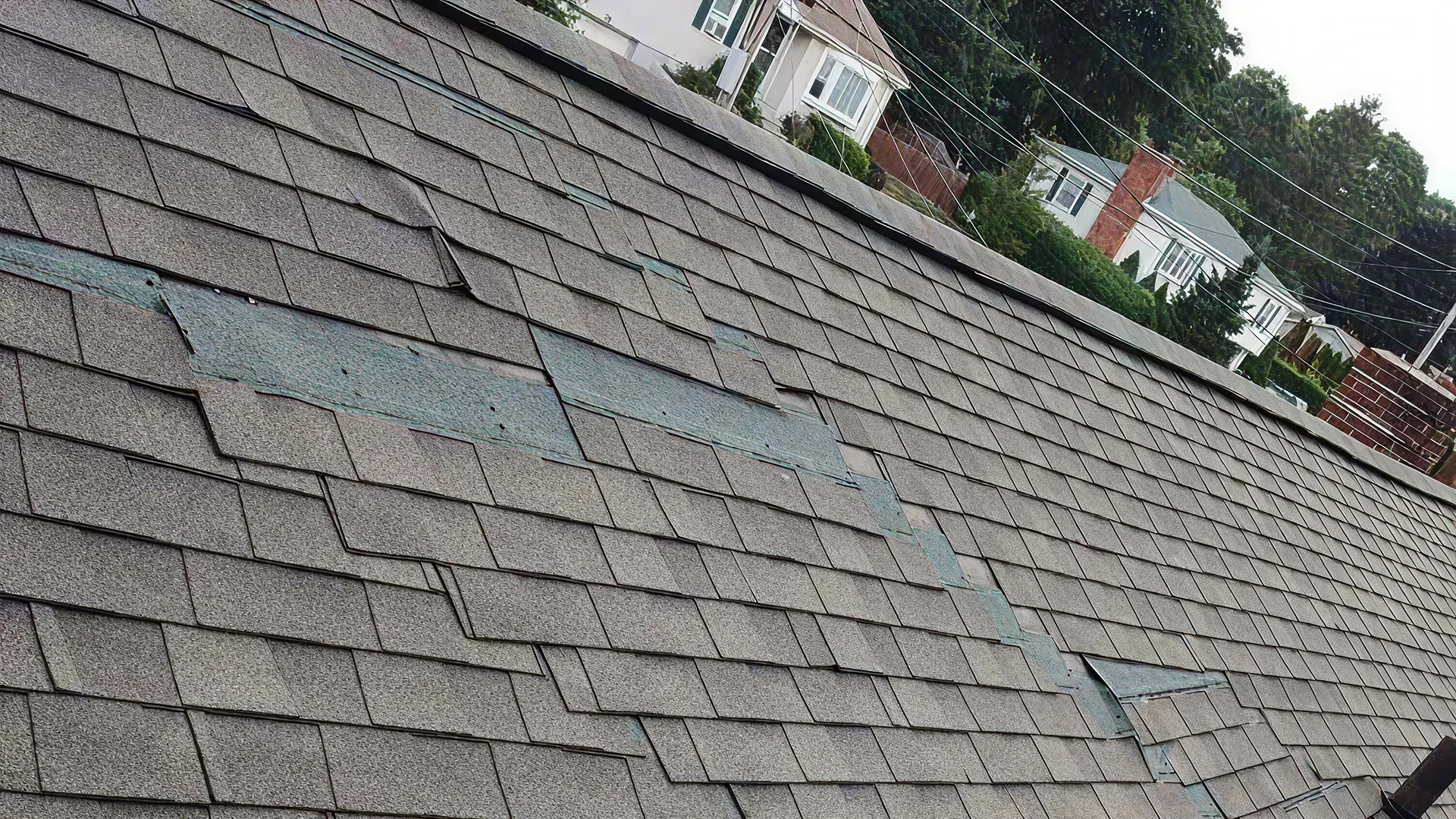 Close-up of damage to roof tiles caused by heat and storms in Florida Close-up of damage to roof tiles caused by heat and storms in Florida