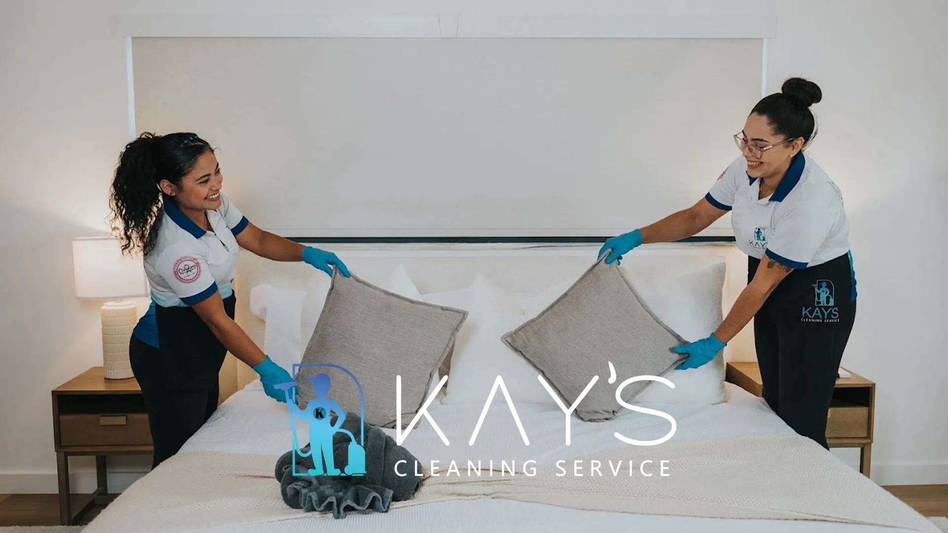Professional house cleaner following a house cleaning checklist in a modern home