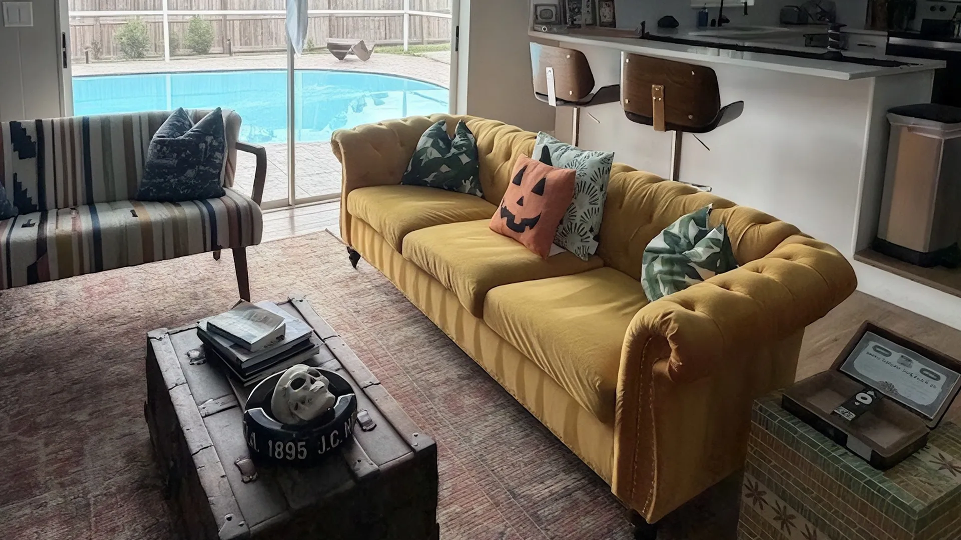 Tidy St. Petersburg living room with pool view and Halloween accents, ready for holiday guests Tidy St. Petersburg living room with pool view and Halloween accents, ready for holiday guests