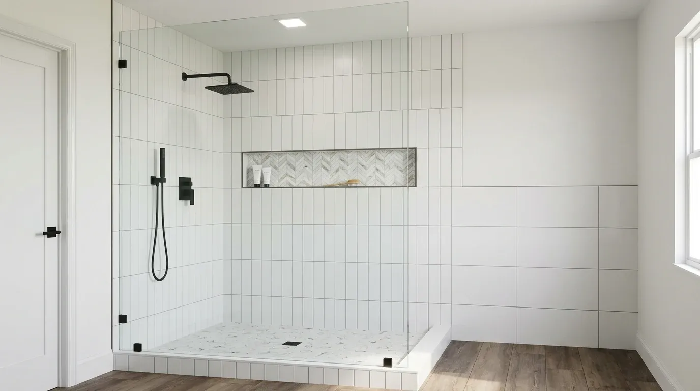Spacious walk-in shower with seamless glass enclosure, large format porcelain tile and modern rainfall showerhead